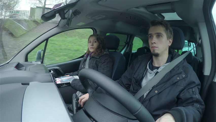 pic Two People Driving In A Car
