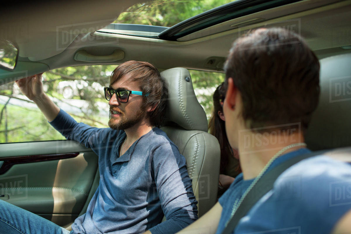 picture Two People Driving In A Car